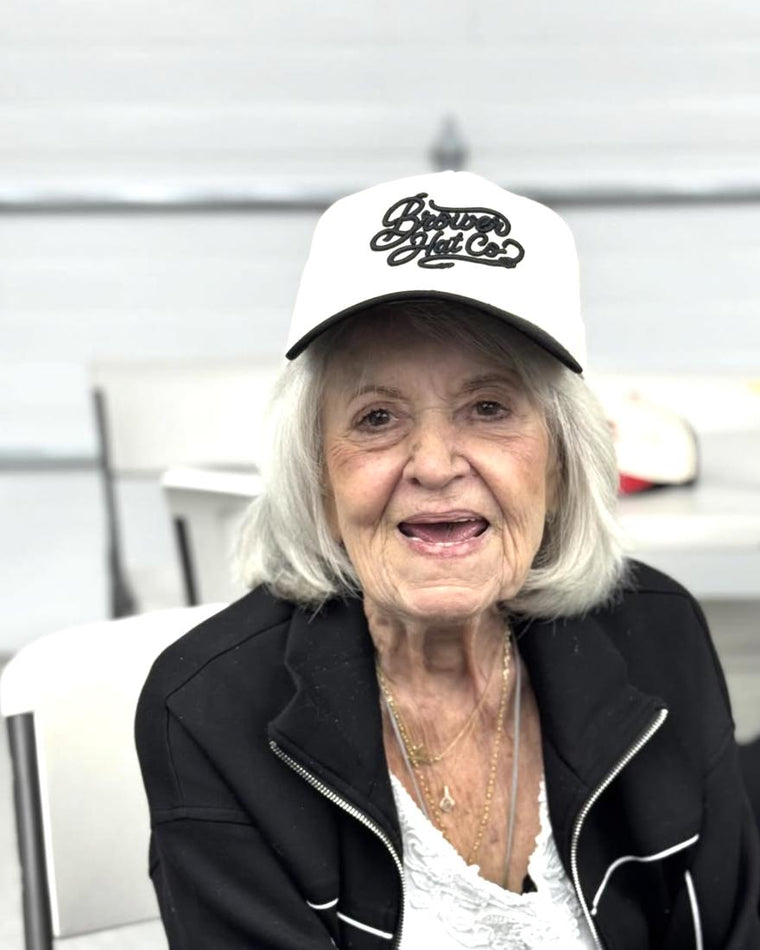 Adele Brower wearing a Brower Hat Co. trucker hat